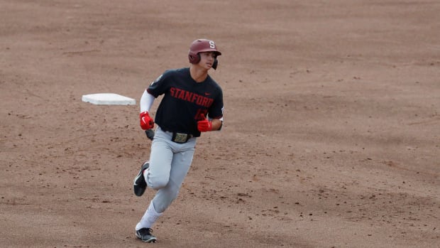 Jun 21, 2021; Omaha, Nebraska, USA; Stanford Cardinal designated hitter Tommy Troy (12) rounds the bases after hitting a home run against the Arizona Wildcats at TD Ameritrade Park. Mandatory Credit: Bruce Thorson-USA TODAY Sports